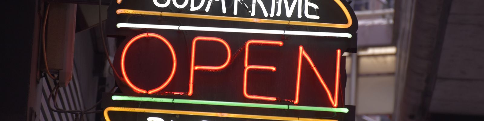 A neon OPEN sign